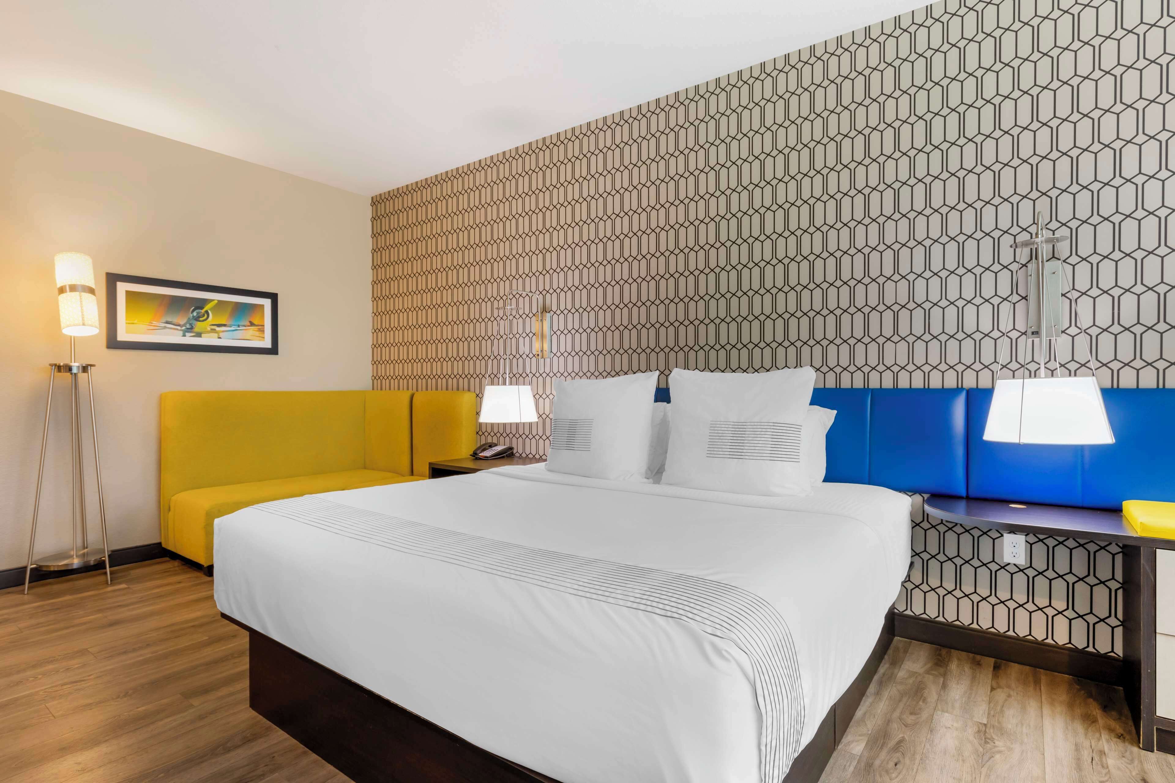 standard room, 1 king bed, non smoking, refrigerator (larger room) | premium bedding, pillow-top beds, blackout curtains, iron/ironing board