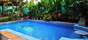 Outdoor pool, pool umbrellas, sun loungers