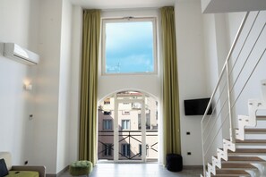 Habitación cuádruple Confort, 2 baños, vista a la ciudad | Vista a la ciudad