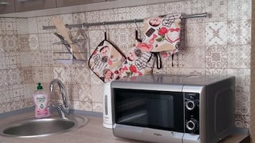 Fridge, microwave, coffee/tea maker