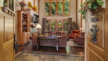 Chalet | Living area | Flat-screen TV, fireplace, video game console, DVD player