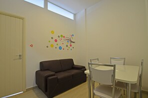 Apartamento | Área de estar | TV de tela plana