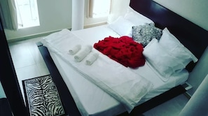 Apartment, 2 Bedrooms, Hill View | Desk, iron/ironing board, free WiFi - Commonlens Inn Hotel. (Entebbe)