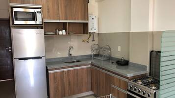 Apartment, 1 Bedroom, Balcony, City View | Private kitchen | Fridge, microwave, stovetop, coffee/tea maker