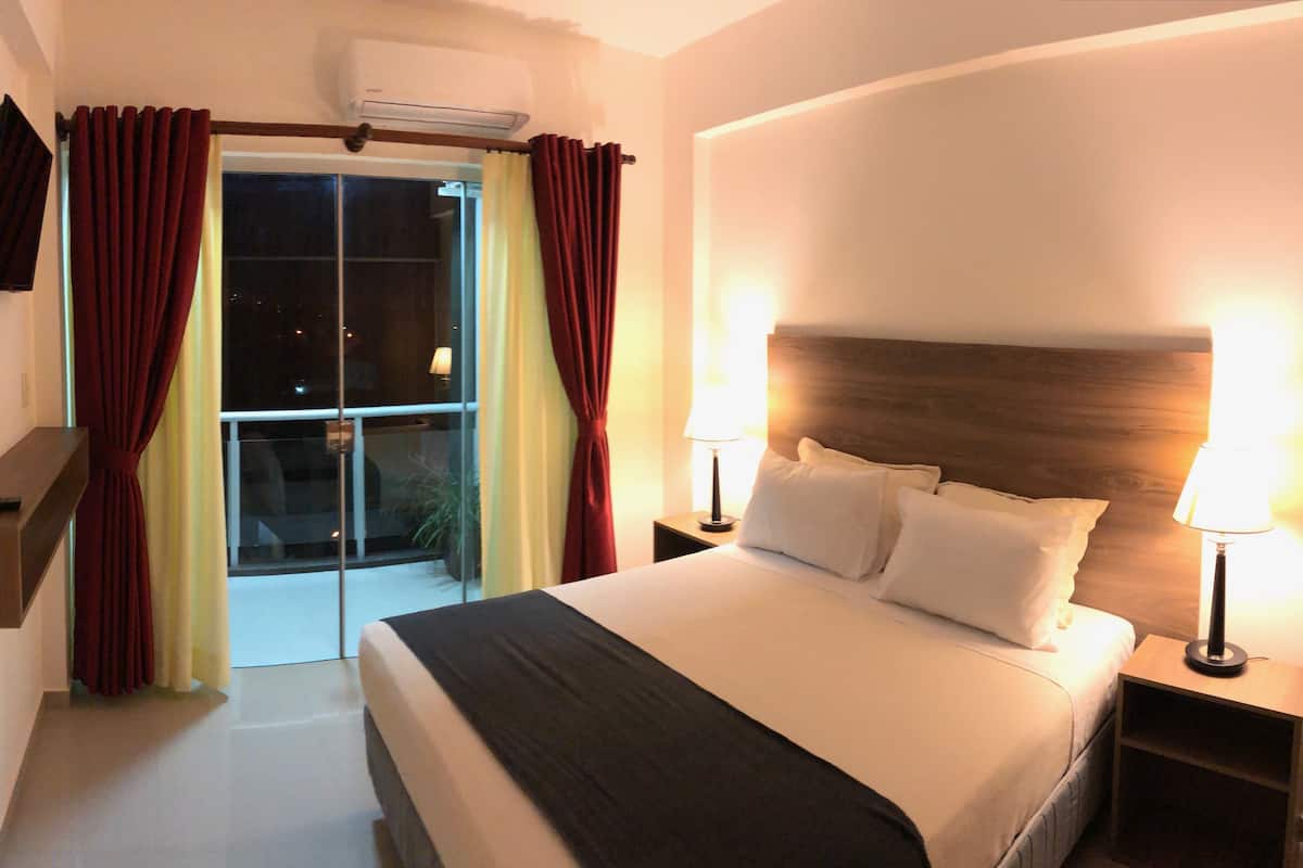 Apartment, 2 Bedrooms, Balcony, City View | 1 bedroom, premium bedding, minibar, in-room safe