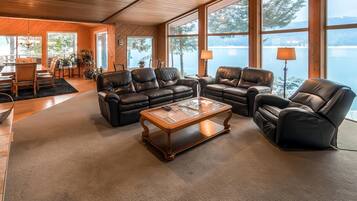 Chalet | Living room | 65-inch flat-screen TV with satellite channels, TV, fireplace