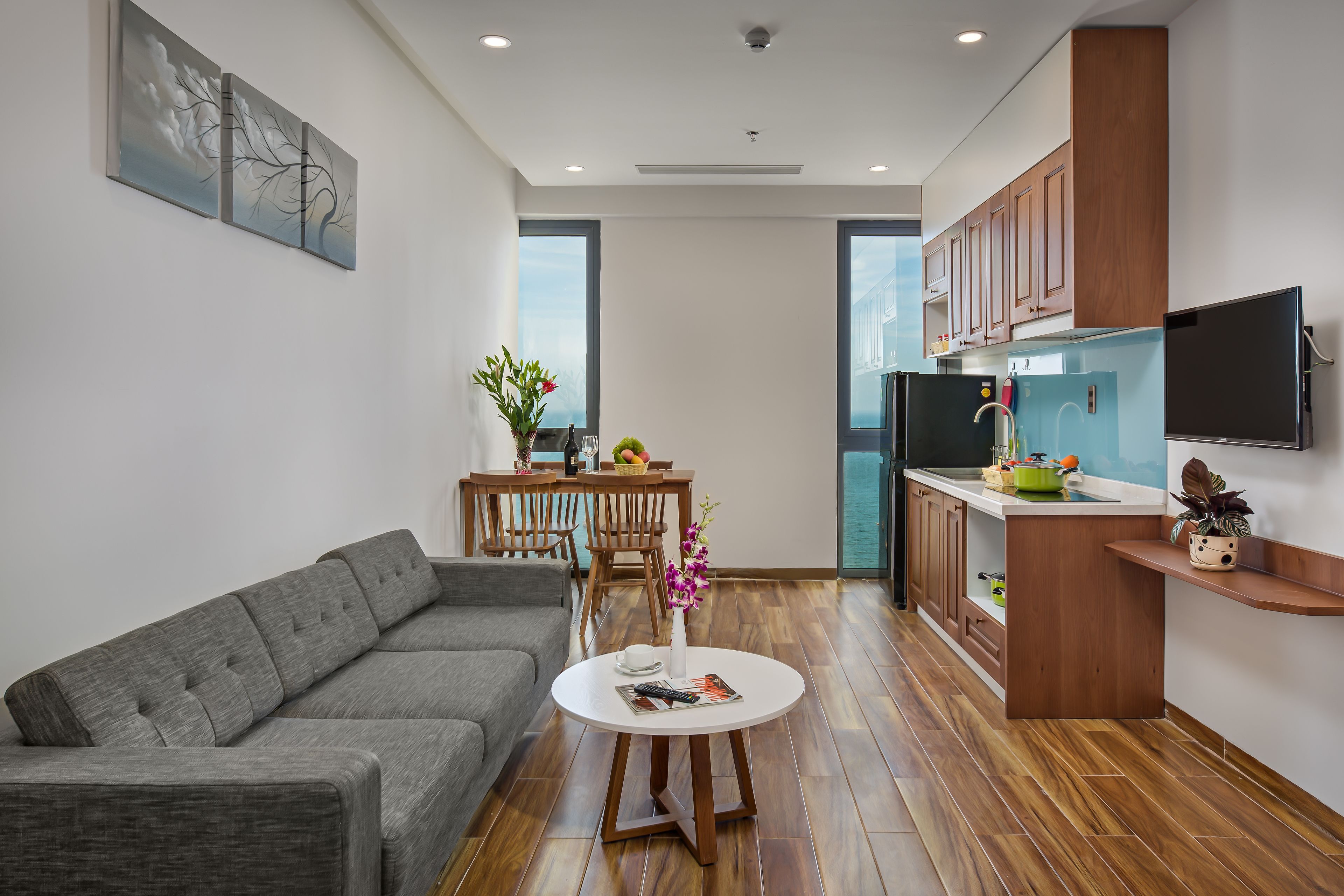 panoramic apartment, 2 bedrooms, ocean view | living room | flat-screen tv