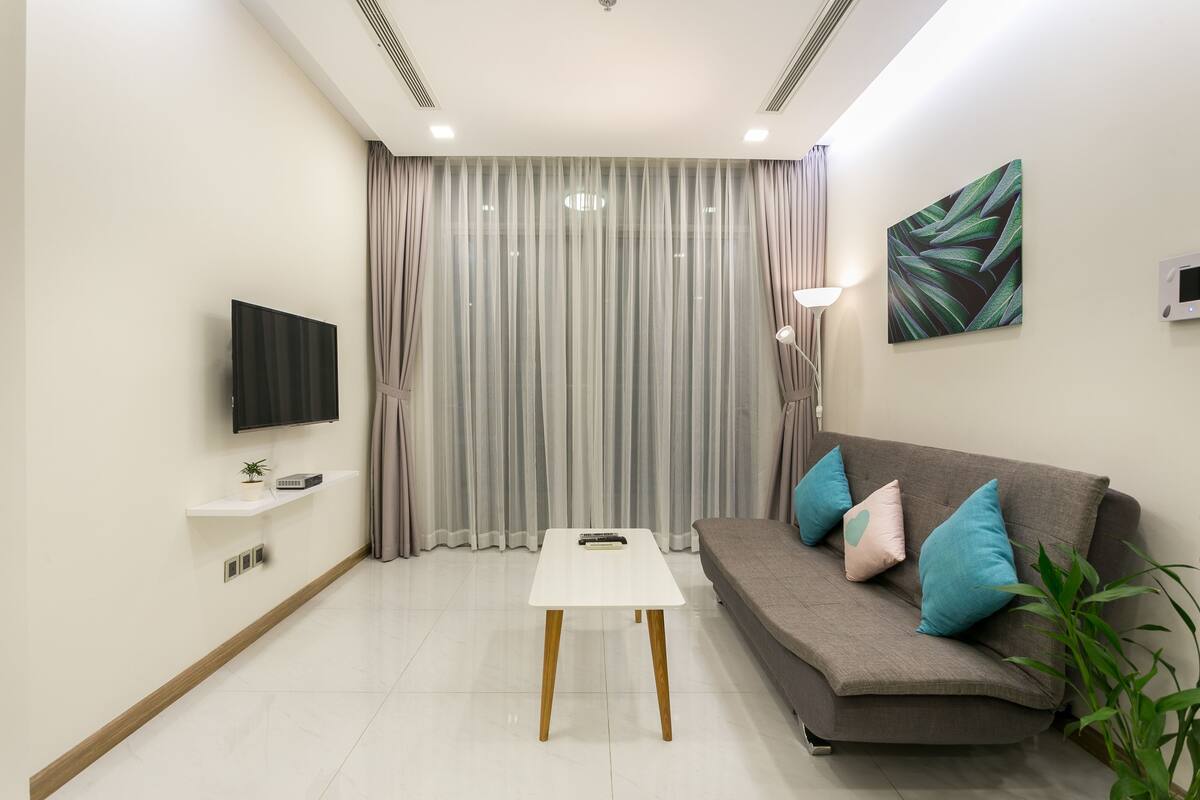 Apartemen Eksekutif, 2 kamar tidur, pemandangan taman | Ruang keluarga | Televisi 32-inci dengan saluran TV kabel