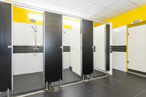 Shower, deep-soaking bathtub, rainfall showerhead, designer toiletries - Hangout Hostel HCM (Ho Chi Minh City)
