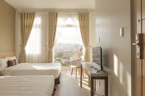 Deluxe Quadruple Room | Minibar, desk, blackout drapes, free WiFi - Cozy Boutique Da Lat Hotel (Da Lat)
