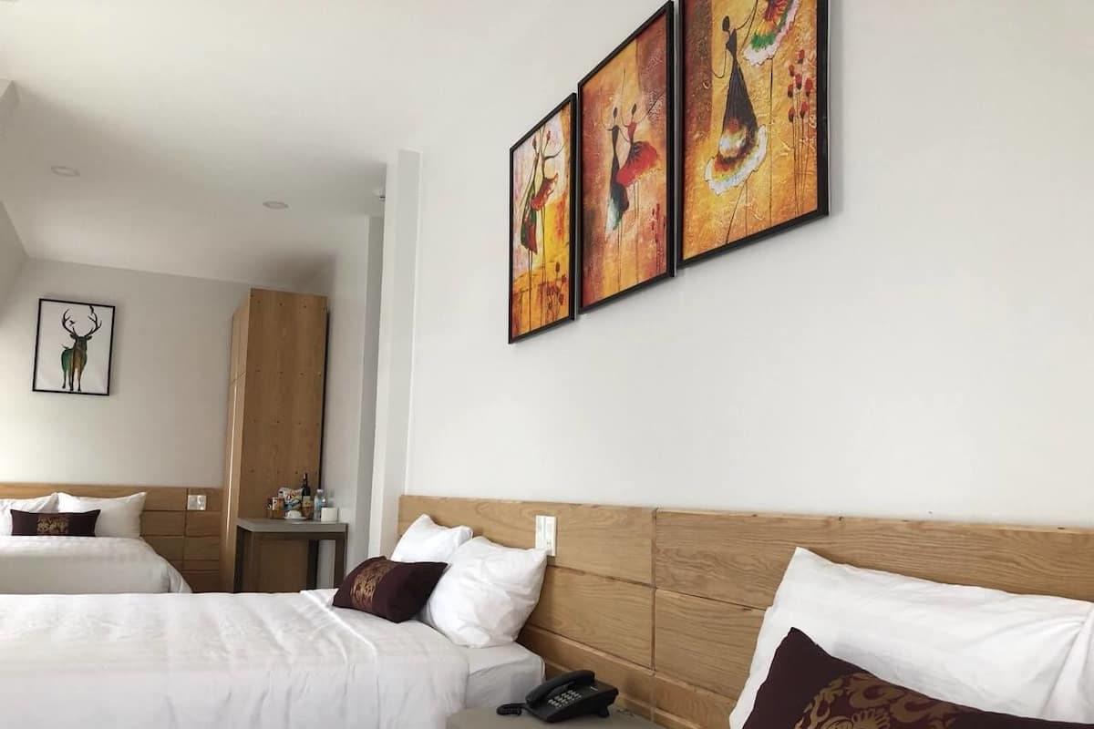 Family Room | Minibar, desk, blackout curtains, free WiFi