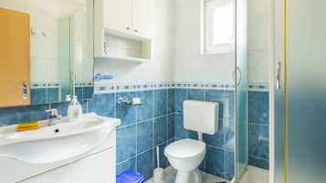 Apartment, 1 Bedroom, Sea View (Plavi) | Bathroom | Shower, hair dryer