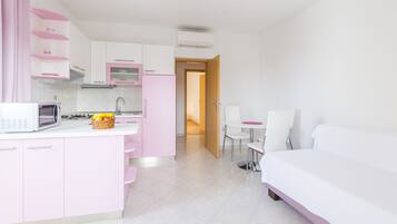 Apartment, 1 Bedroom, Sea View | Living area | Flat-screen TV