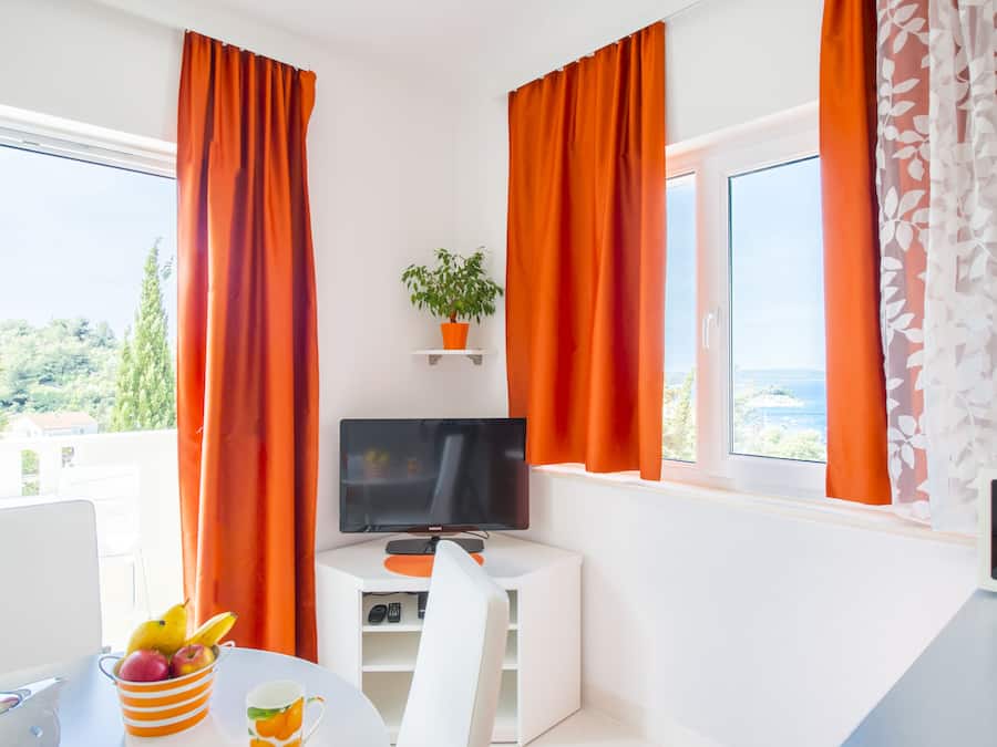 Apartment, 1 Bedroom, Sea View | Living area | Flat-screen TV