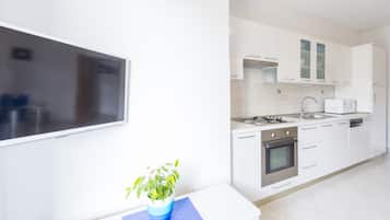 Apartment, 1 Bedroom, Sea View (Plavi) | Living area | Flat-screen TV