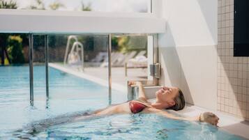 Outdoor pool, open 8:00 AM to 7:00 PM, free cabanas, pool umbrellas