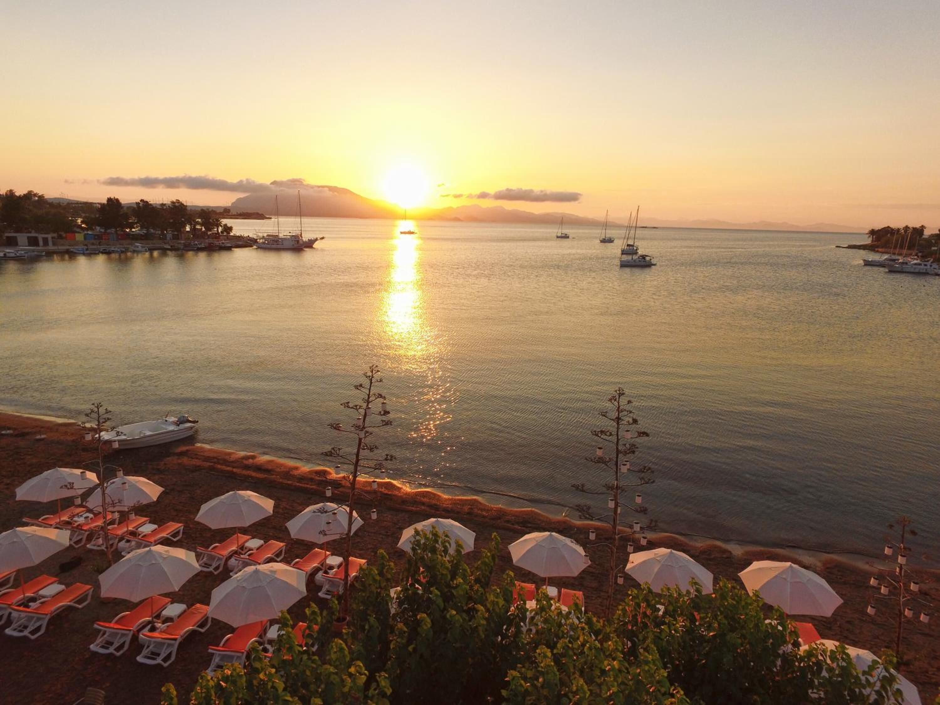 private beach, sun-loungers, beach umbrellas