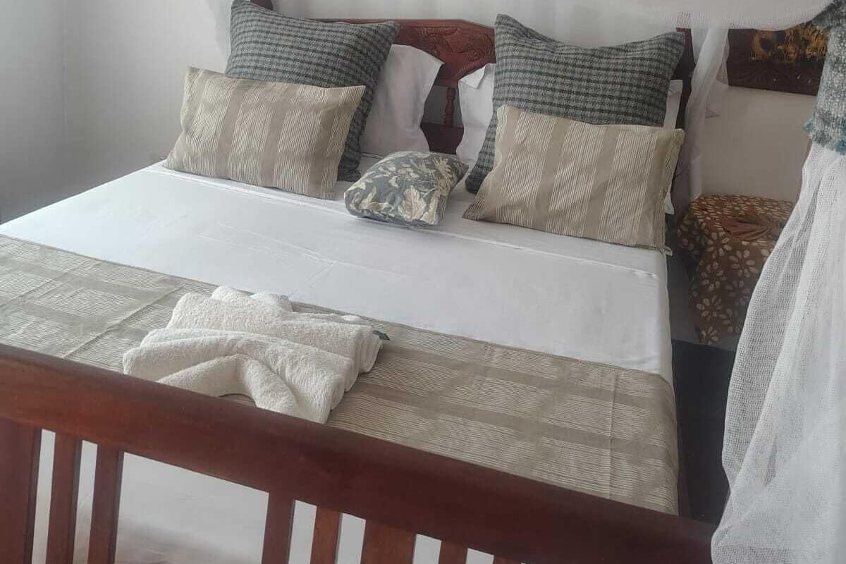 Luxe beddengoed, een minibar, een kluis op de kamer, een bureau