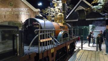 A vintage steam locomotive at a railway museum.