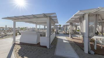 Private beach nearby, white sand, sun loungers, beach umbrellas