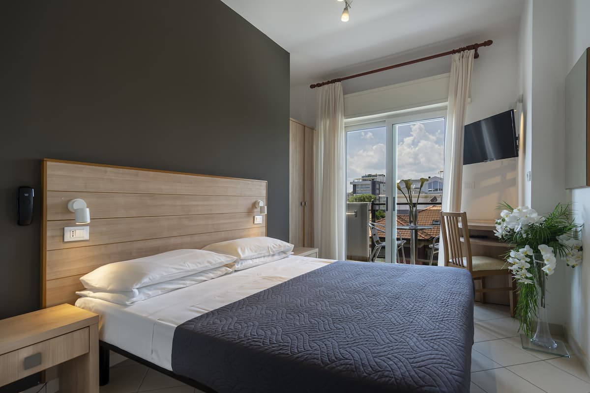Chambre Économique Double ou avec lits jumeaux, balcon