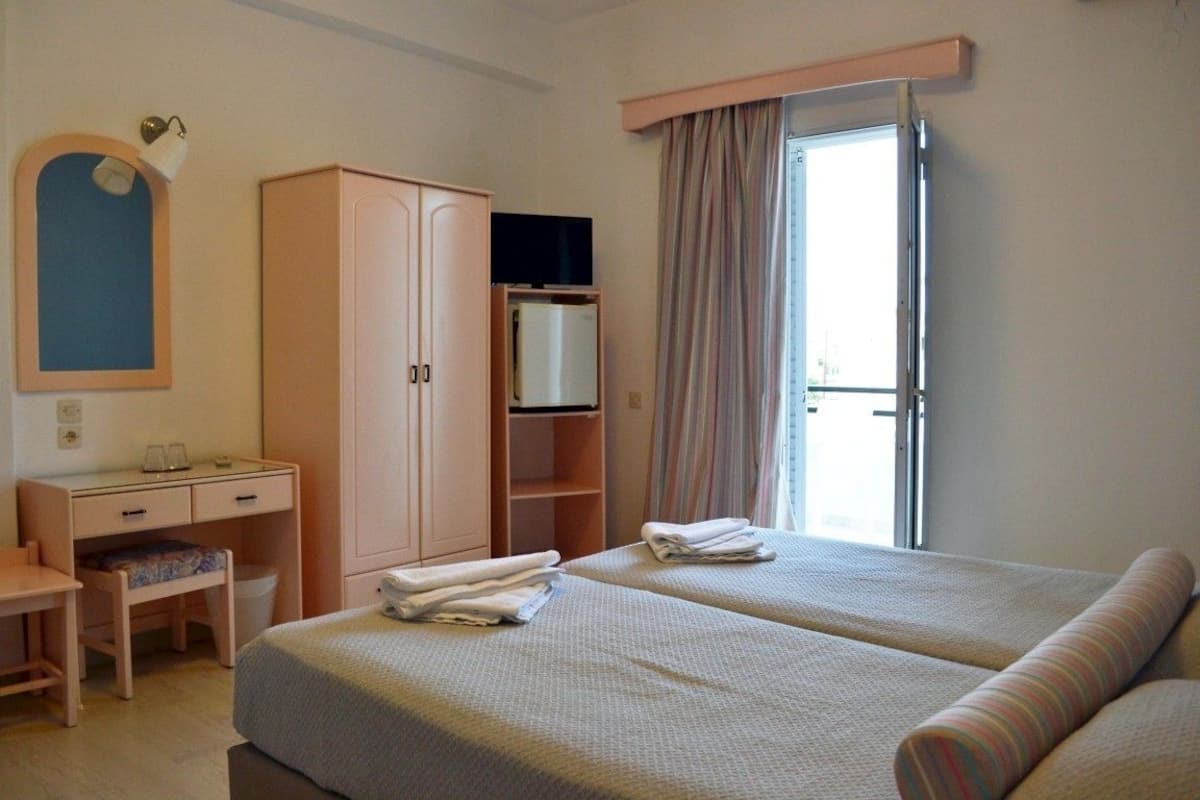 Double or Twin Room, Pool View | Iron/ironing board, free WiFi, bed sheets