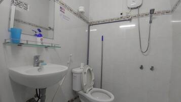 Shower, free toiletries, hair dryer, slippers