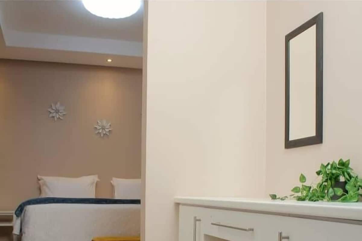 Casa ejecutiva | 1 dormitorio, caja fuerte, tabla de planchar con plancha y wifi gratis