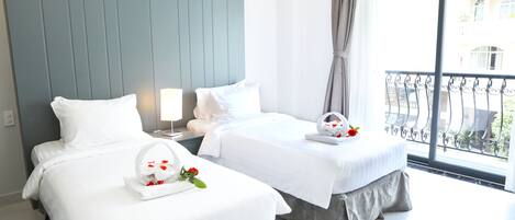 2 Single Bed | Free minibar items, in-room safe, desk, iron/ironing board