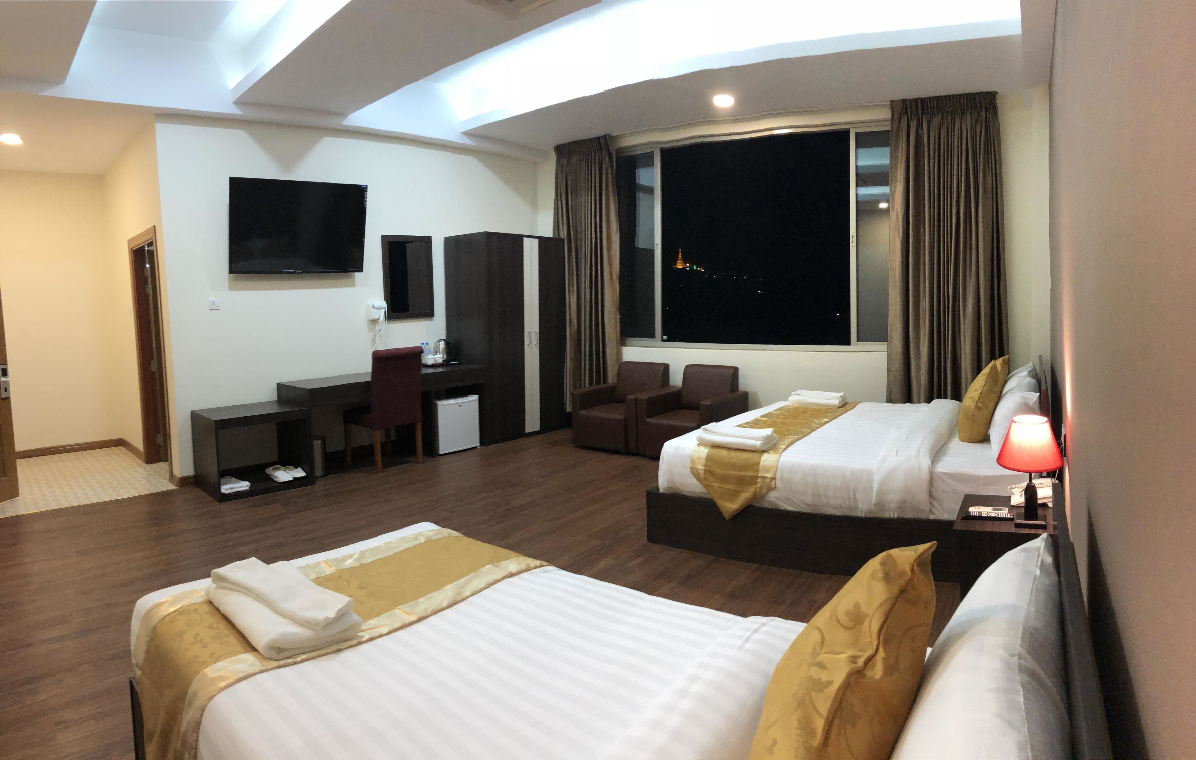 家庭房 | 迷你吧、办公桌、折叠床/加床（额外收费）、免费 WiFi