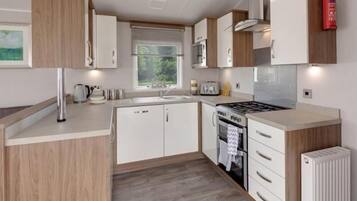 Fridge, microwave, toaster, cookware/dishes/utensils