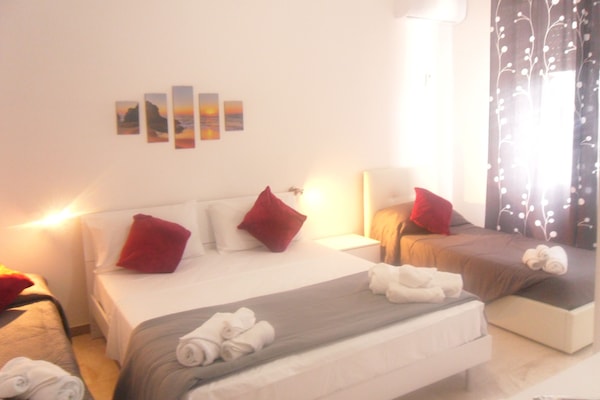 Chambre quadruple majestueuse | Minibar, décor unique, ameublement unique, système d’insonorisation