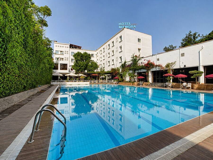 Outdoor pool, pool umbrellas, sun loungers
