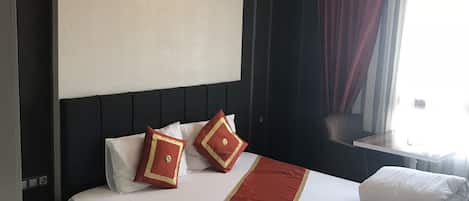 Junior Suite | Free minibar, in-room safe, desk, iron/ironing board