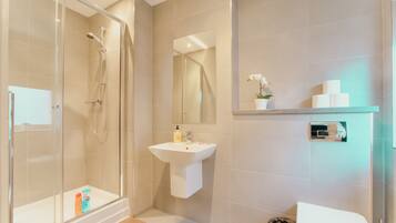 Shower, free toiletries, hair dryer, towels