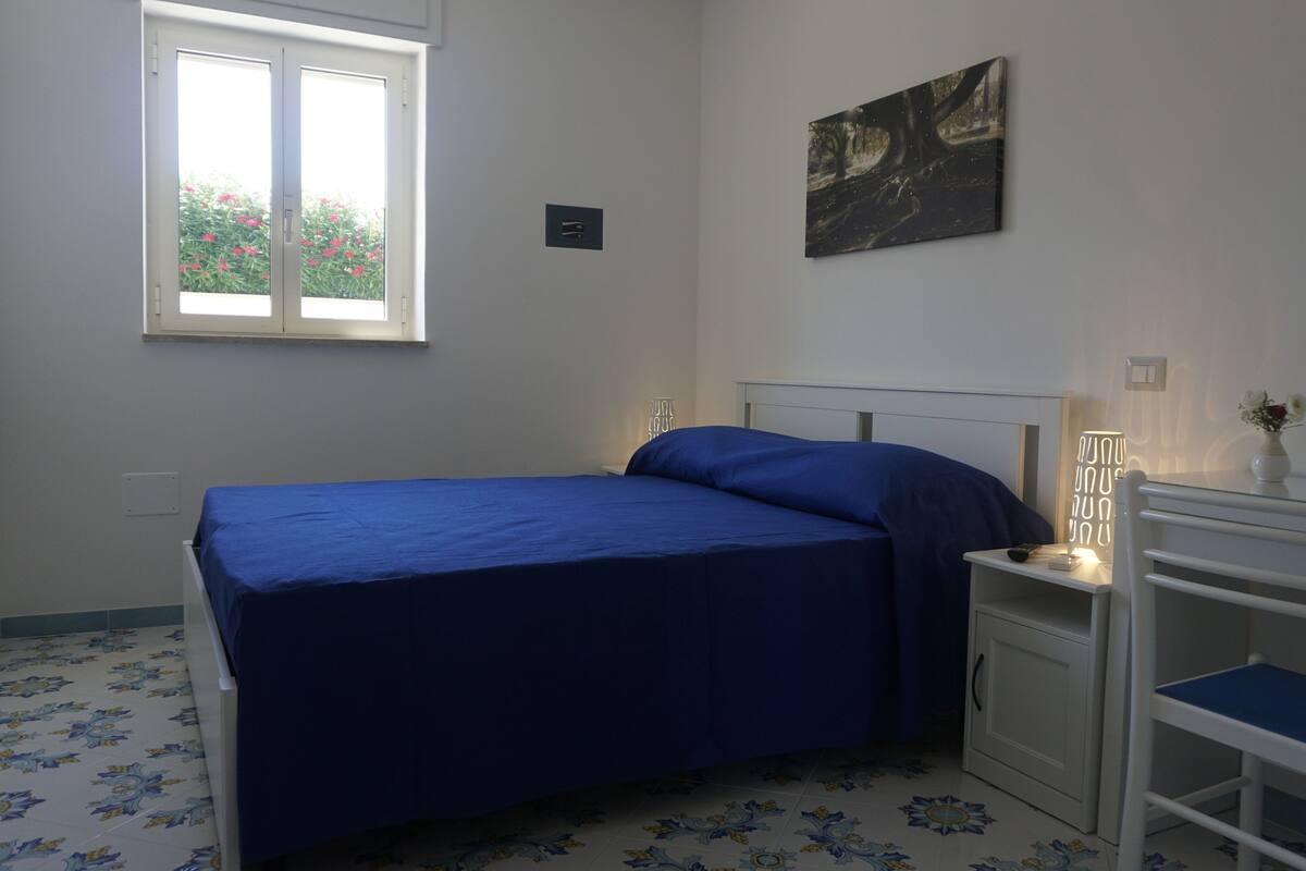Family Quadruple Room | Minibar, in-room safe, desk, free WiFi