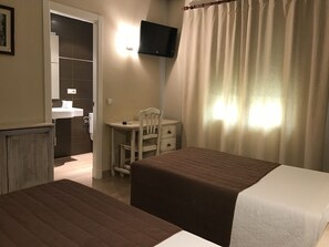 Cortinas blackout, wifi gratis y ropa de cama