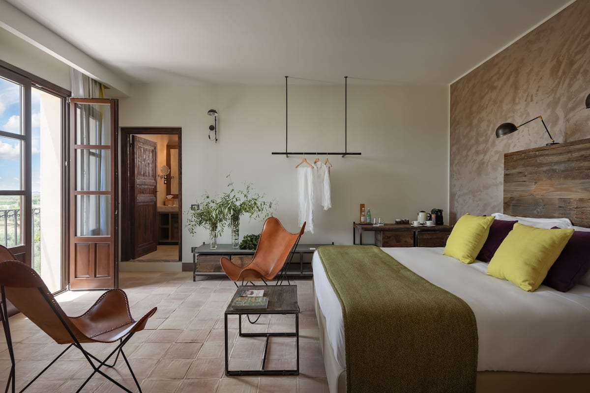 Junior Suite | 1 bedroom, premium bedding, minibar, in-room safe