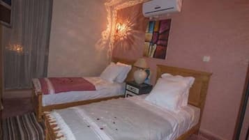 Memory foam beds, blackout drapes, iron/ironing board, rollaway beds