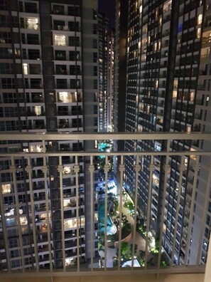 A high-rise building with multiple floors, each with balconies. The building has a modern architectural design with a grid-like facade. - Hoang Phuong Apartment (Ho Chi Minh City)