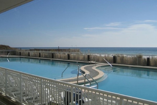 View of the large heated freshwater pool & Gulf of Mexico just steps from patio
