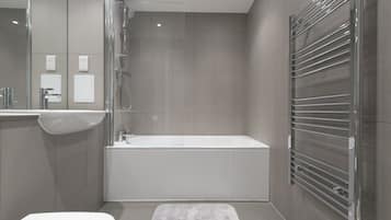 Basic Apartment, 2 Bedrooms | Bathroom | Separate bathtub and shower, free toiletries, hair dryer, towels