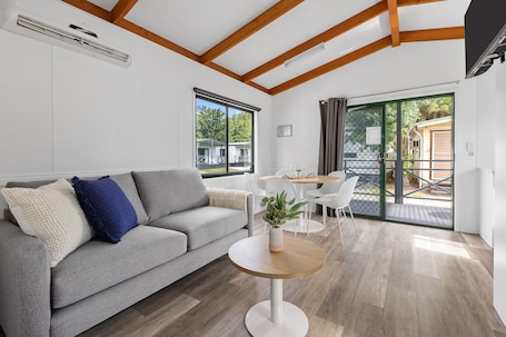 Deluxe Cabin (2BR) - Sleeps 6 | Living area. Tasman Holiday Parks - Geelong