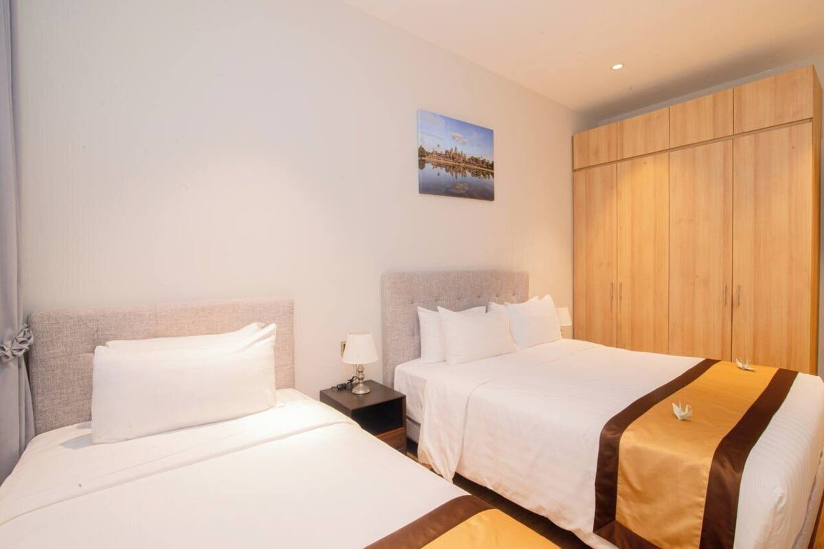 Suite Deluxe | Camas con efecto memoria y caja de seguridad en la habitación 