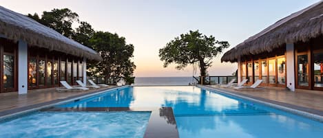 Outdoor pool, open 6:00 AM to midnight, sun loungers