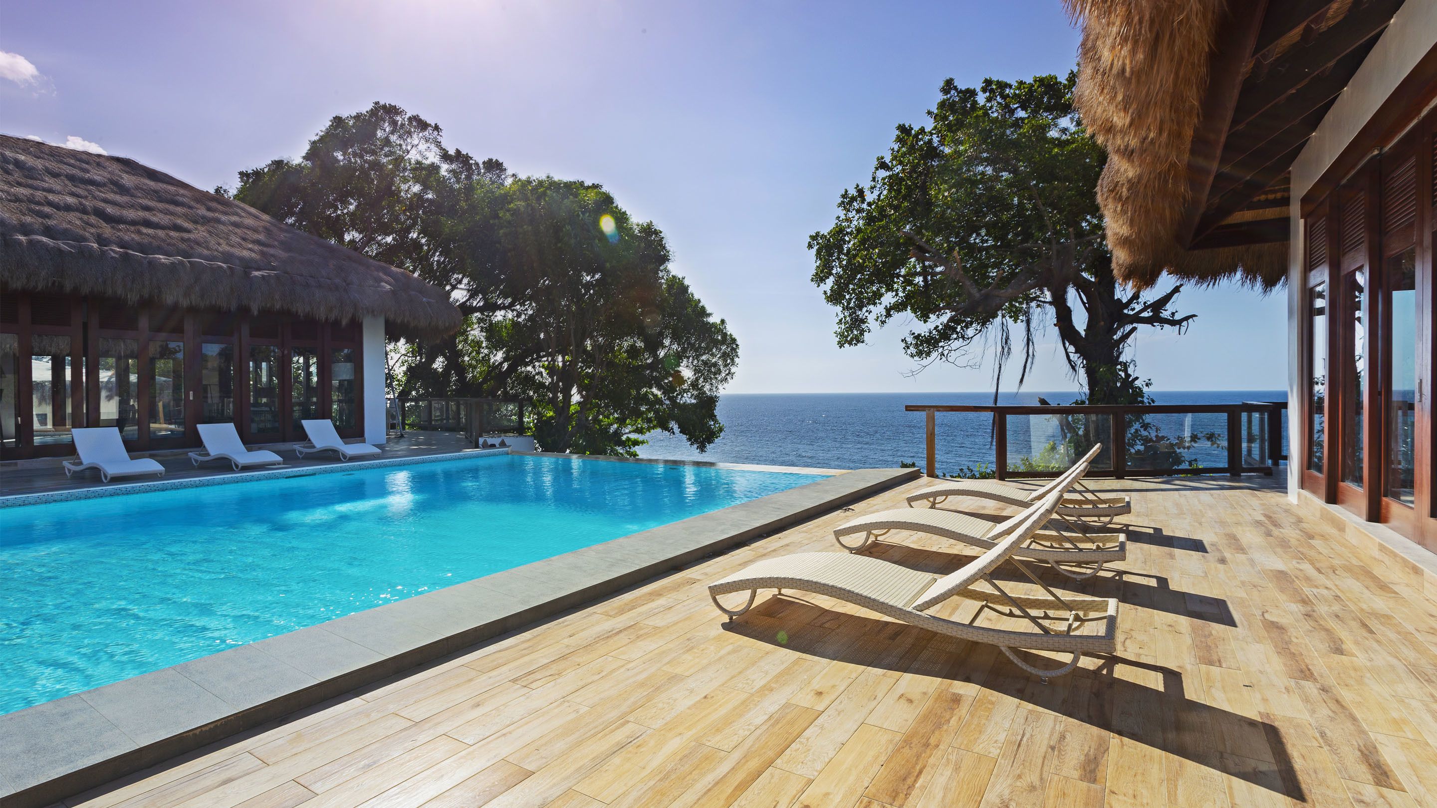 Outdoor pool, open 6:00 AM to midnight, sun loungers