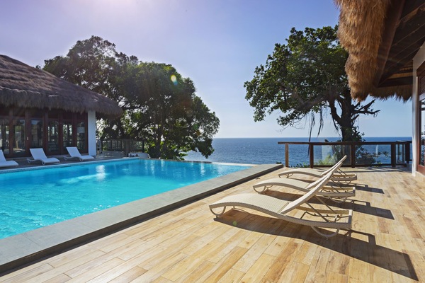 Outdoor pool, open 6:00 AM to midnight, pool loungers