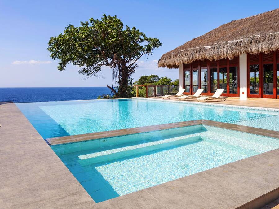 Outdoor pool, open 6:00 AM to midnight, pool loungers