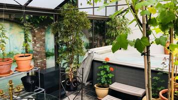 Superior Apartment, Sauna, Garden Area | Private spa tub