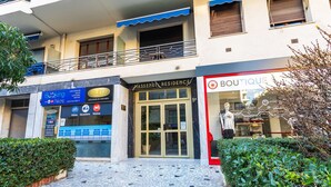 A building with a storefront labeled "MASSENETT RESIDENCE" and "BOUTIQUE." - LE FRANCE-MASSENET AP3015 by RIVIERA HOLIDAY HOMES (Niza)